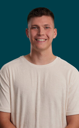Portrait von Student Justin aus dem Studiengang ITV.