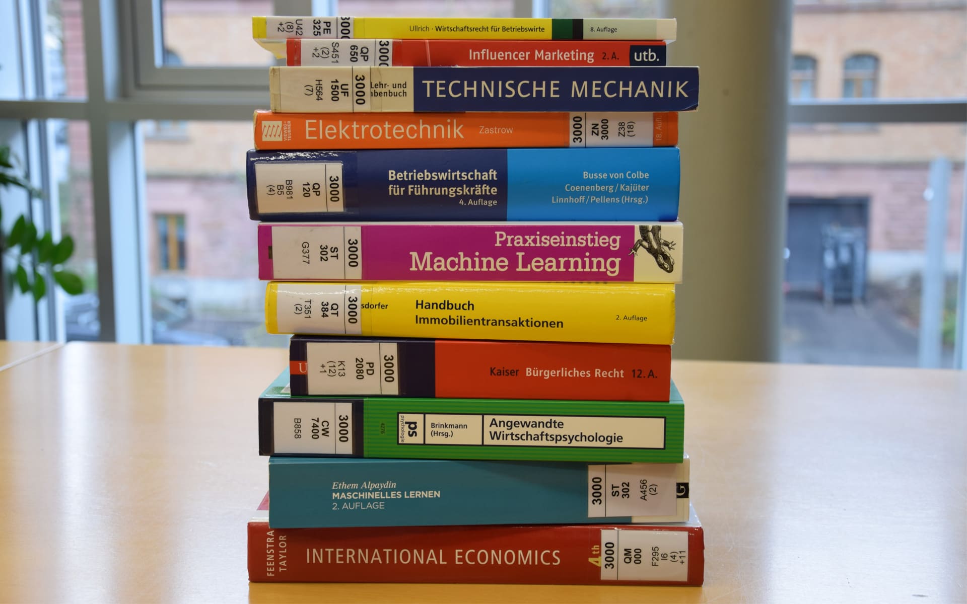Colored books stapled on a table