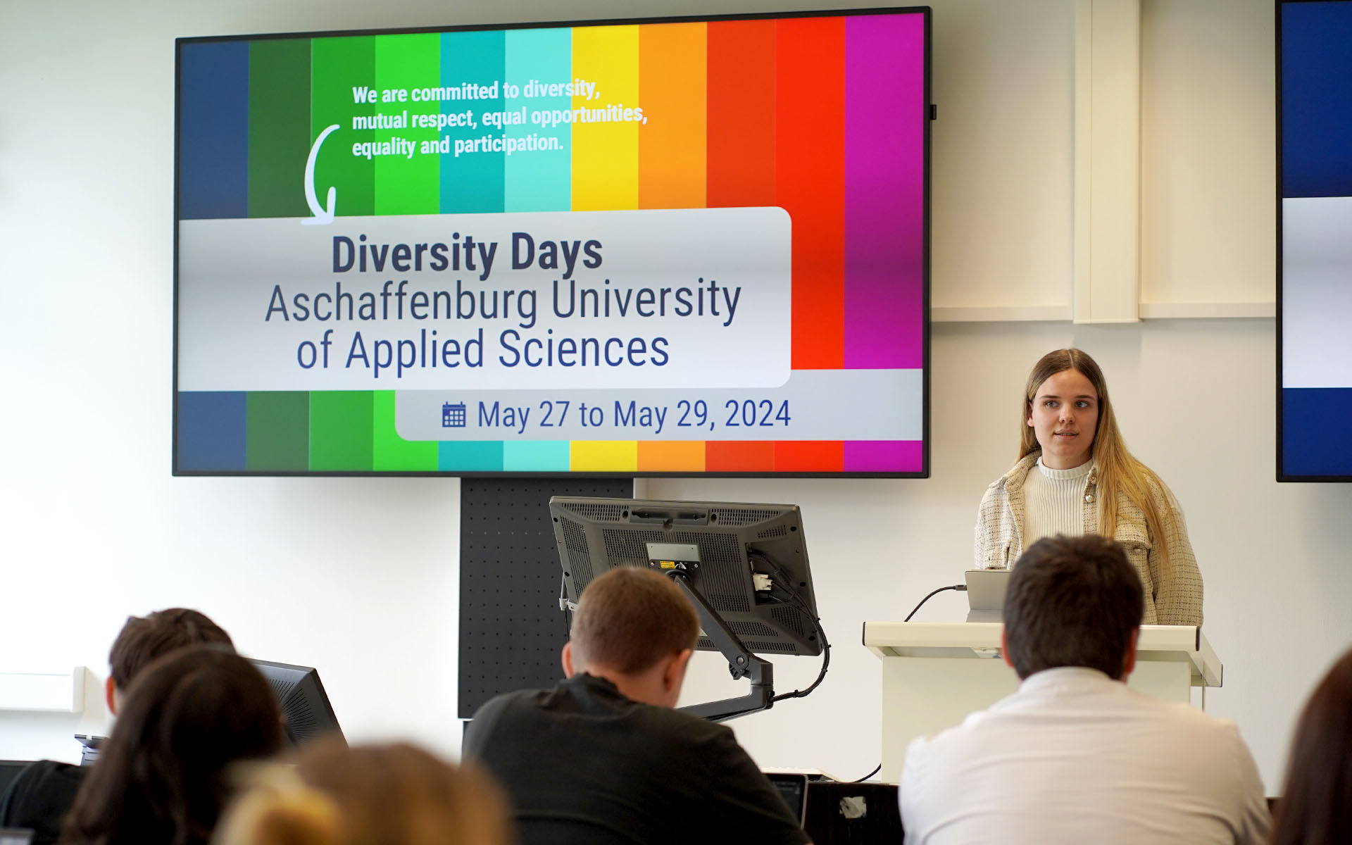 woman welcomes students on Diversity Days